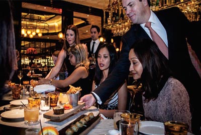 People being served at restaurant